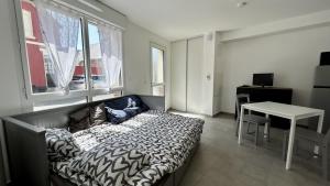 Appartements Premiere Vague - proche de la plage : photos des chambres