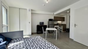 Appartements Premiere Vague - proche de la plage : photos des chambres