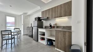 Appartements Premiere Vague - proche de la plage : photos des chambres