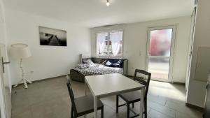 Appartements Premiere Vague - proche de la plage : photos des chambres