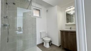 Appartements Premiere Vague - proche de la plage : photos des chambres