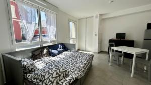Appartements Premiere Vague - proche de la plage : photos des chambres
