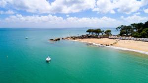 Maisons de vacances A 800 m de la mer, jolie maison avec jardin pour 7 : photos des chambres