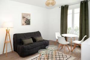 Appartements Charming studio at the gates off Paris : photos des chambres