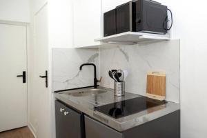 Appartements Charming studio at the gates off Paris : photos des chambres