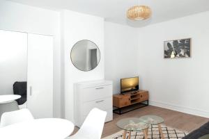 Appartements Charming studio at the gates off Paris : photos des chambres