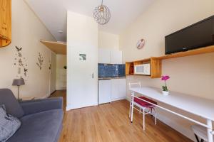 Appartements Les Fleurs - Proche Du Mont-Dore : photos des chambres