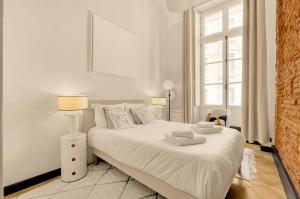 Appartements Affogato - Quelques metres de la Place du Capitole : photos des chambres