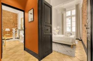 Appartements Affogato - Quelques metres de la Place du Capitole : photos des chambres