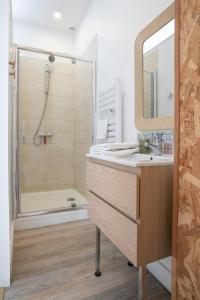 Appartements AUDREY-Quartier Mairie-arenes antiques-Clim : photos des chambres