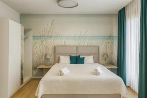 Exklusive Rückzugsorte direkt am türkisblauen See