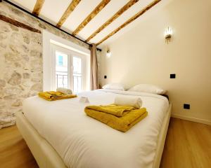 Appartements Le Nid de Revennes - sejour cosy dans la vieille ville d-Antibes : photos des chambres