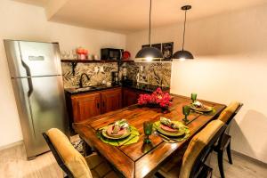 Villa Romana - Experiência única em frente à Praia de Itapuã, apartamento todo climatizado