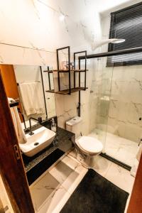 Villa Romana - Experiência única em frente à Praia de Itapuã, apartamento todo climatizado