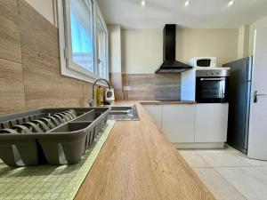 Appartements Le Sully Nest - Clim et parking : photos des chambres