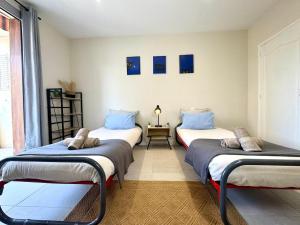 Appartements Le Sully Nest - Clim et parking : photos des chambres