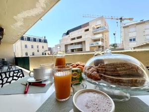 Appartements Le Sully Nest - Clim et parking : photos des chambres