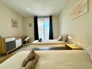 Appartements Le Sully Nest - Clim et parking : photos des chambres