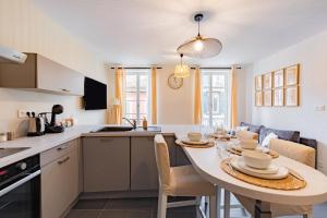 Appartements Plein centre - climatise - a proximite cite medievale : photos des chambres