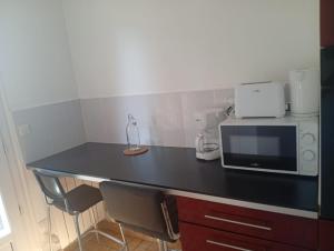 Appartements Maison 2 - entre ville et verdure : photos des chambres