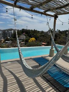 Estudio Nuevo a 7 min de playa, GYM, 2 albercas, Coworking, cerca de Plaza Central