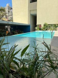 Estudio Nuevo a 7 min de playa, GYM, 2 albercas, Coworking, cerca de Plaza Central