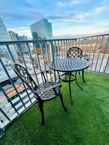 HighriseBalconyRooftopPoolGymFree Parking