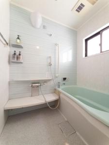 ゲストハウス陽だまりのうたたねこ 月と太陽