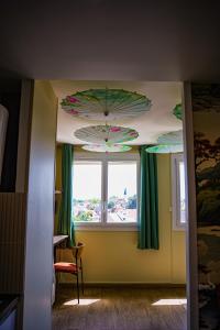Appartements Le Jardin Suspendu : photos des chambres