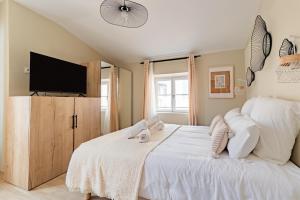 Appartements Plein centre - climatise - a proximite cite medievale : photos des chambres