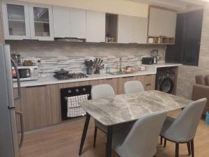 spacious furnished two bedroom apartment with children playground private parking fully equipped gym swimming pool and scenic city views