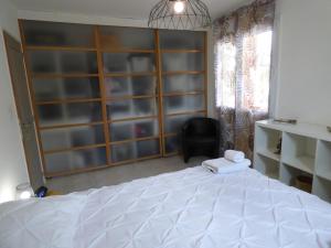Villas Villa climatisee avec jardin, BBQ, piscine et parking : photos des chambres