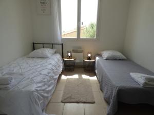 Villas Villa climatisee avec jardin, BBQ, piscine et parking : photos des chambres