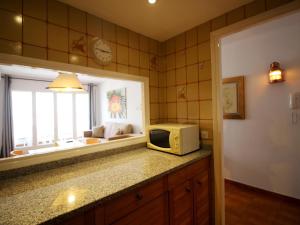 LLANÇÀ 8 LATERAL - Apartamento con vistas al mar, parking y Wifi. - ES-228-55