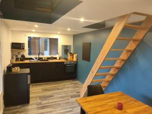 Maisons de vacances Sejour au Jardin de Cupidon avec jacuzzi et sauna : photos des chambres