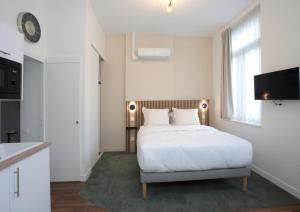 Appartements Motte Fenelon Appart : photos des chambres
