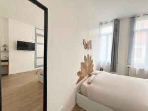 Appartements Maison Hypercentre avec jardin, ideale groupes, 5 chambres 5 salles de bain : photos des chambres