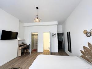 Appartements Maison Hypercentre avec jardin, ideale groupes, 5 chambres 5 salles de bain : photos des chambres