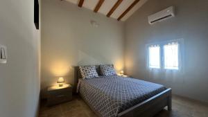 Villas Villa Sarde, villa entiere avec parking : photos des chambres