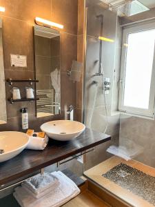 Hotels Hotel Les Vallees Labellemontagne : photos des chambres