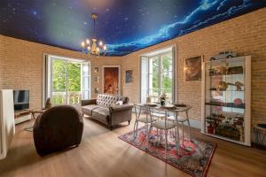 Appartements LE chateau des sorciers & spa experience : photos des chambres