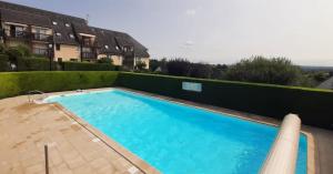 Appartements Family T2 with pool and garden in Touques : photos des chambres