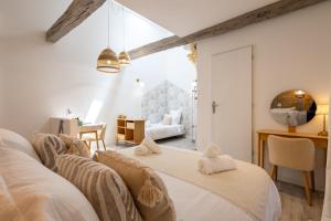 Appartements L-Opale - Duplex Calme en Hypercentre : photos des chambres