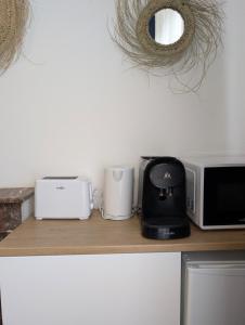 Appartements Barbieux Charmant studio au pied du metro : photos des chambres