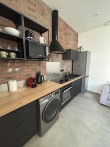 Appartements Industrial flat : photos des chambres