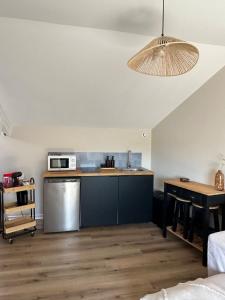 Appartements Un nid en ville - Studio centrale, cosy et calme : photos des chambres