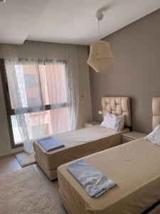 Near Gueliz 2 Bedrooms 3 ACs Fast WiFi Netflix