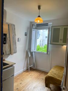 Studette équipée de 9m2 dans le 10ème