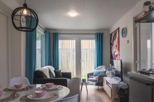 Vrolijk chalet met hottub & omheinde tuin VP094