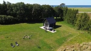 DIDAMM holiday cabin by the open sea in Strante